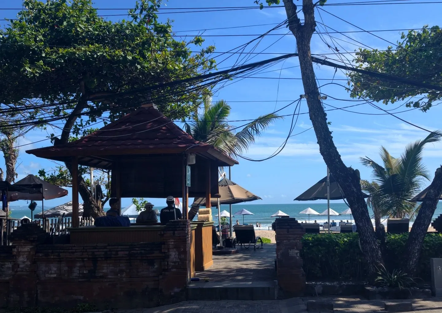 The beach bar pavilion at the back of the hotel, opening onto the sand and the sea